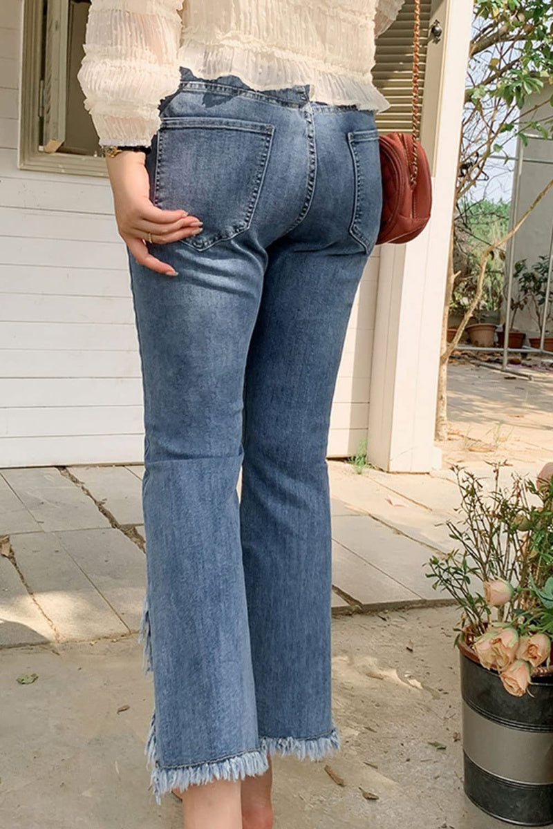Chouyatou Women Cute Stretch Denim Jeans Ripped Distressed Frayed Hem Denim Pants Tassel Fringe Cropped Jeans